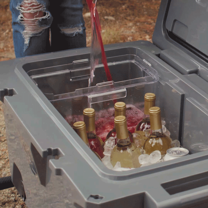 The removable drink tank being filled up and the tap