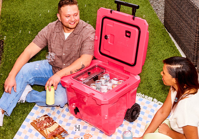 Friends having a picnic with a BruTank 35qt cooler
