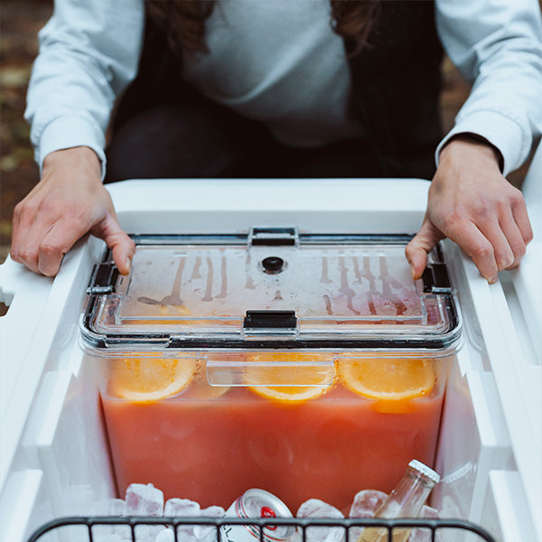 Man placing drink tank inside the BruTank